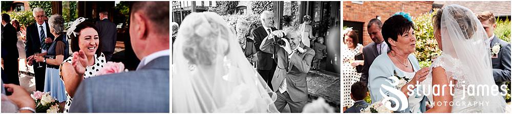 Creative candid photographs capturing the guests enjoying the drinks reception at The Moat House in Acton Trussell by Penkridge Wedding Photographer Stuart James