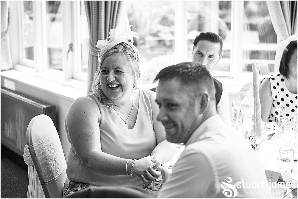 Photos that capture the mood and enjoyment as the wedding speeches bring fabulous reactions from the wedding party at The Moat House in Acton Trussell by Penkridge Wedding Photographer Stuart James