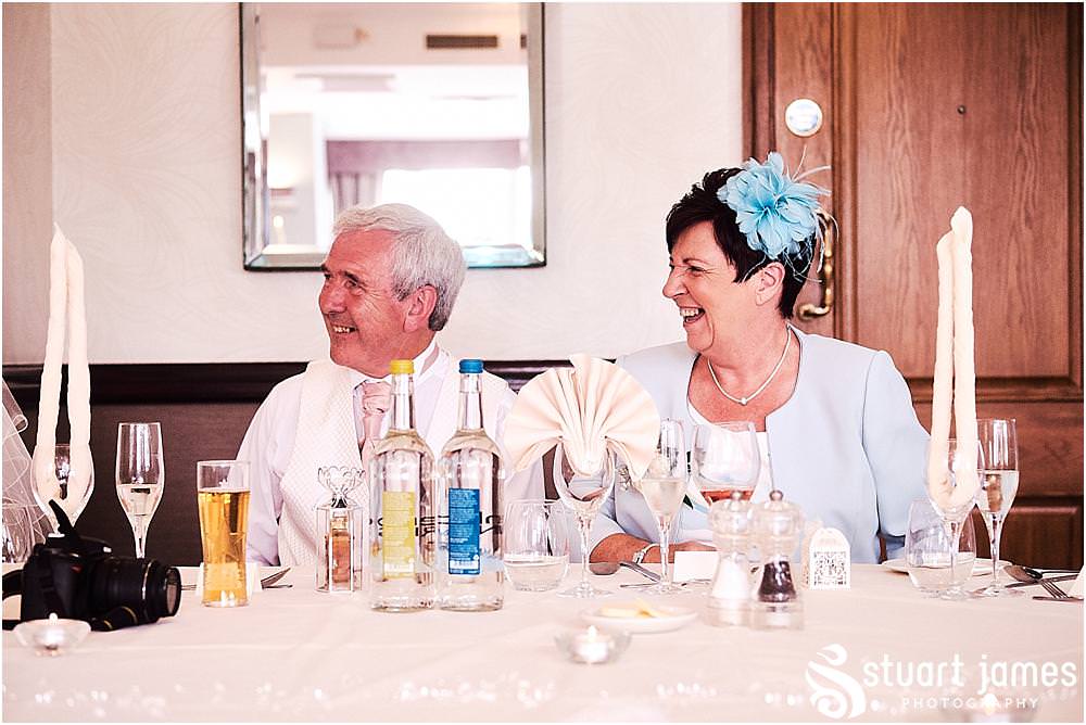 Photos that capture the mood and enjoyment as the wedding speeches bring fabulous reactions from the wedding party at The Moat House in Acton Trussell by Penkridge Wedding Photographer Stuart James