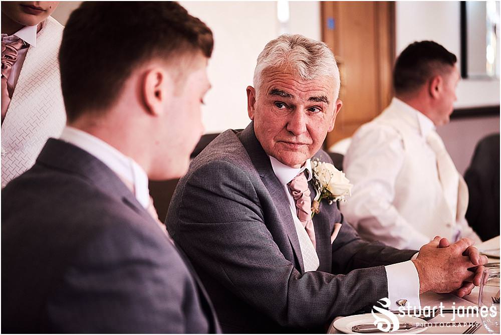 Natural candid photographs capturing the guests enjoying the wedding breakfast at The Moat House in Acton Trussell by Penkridge Wedding Photographer Stuart James