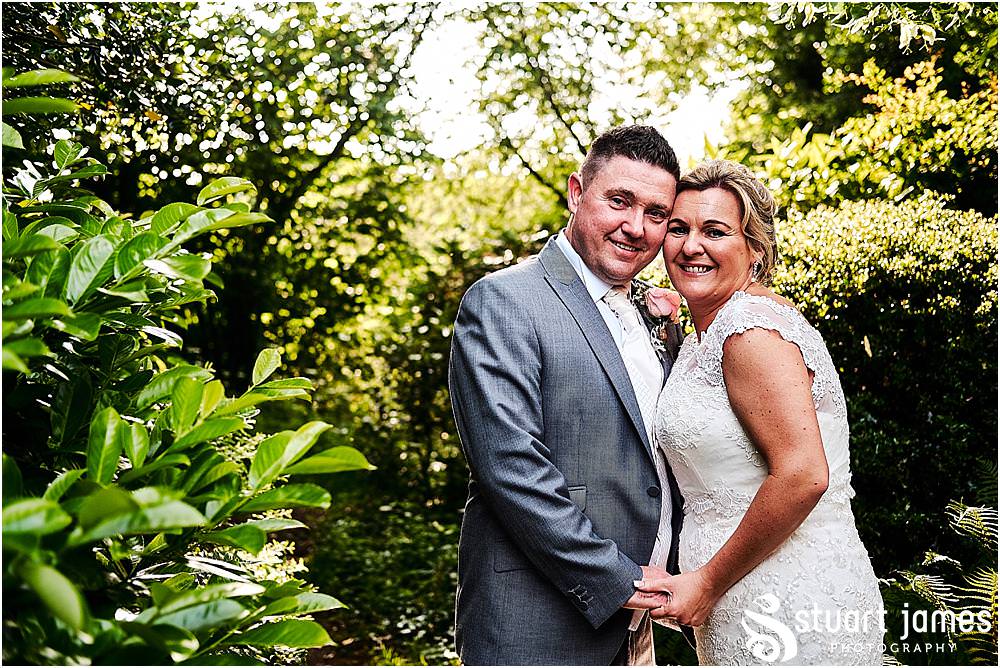 Creative portraits utilising the stunning golden light to bring the wedding story to a stunning close at The Moat House in Acton Trussell by Penkridge Wedding Photographer Stuart James