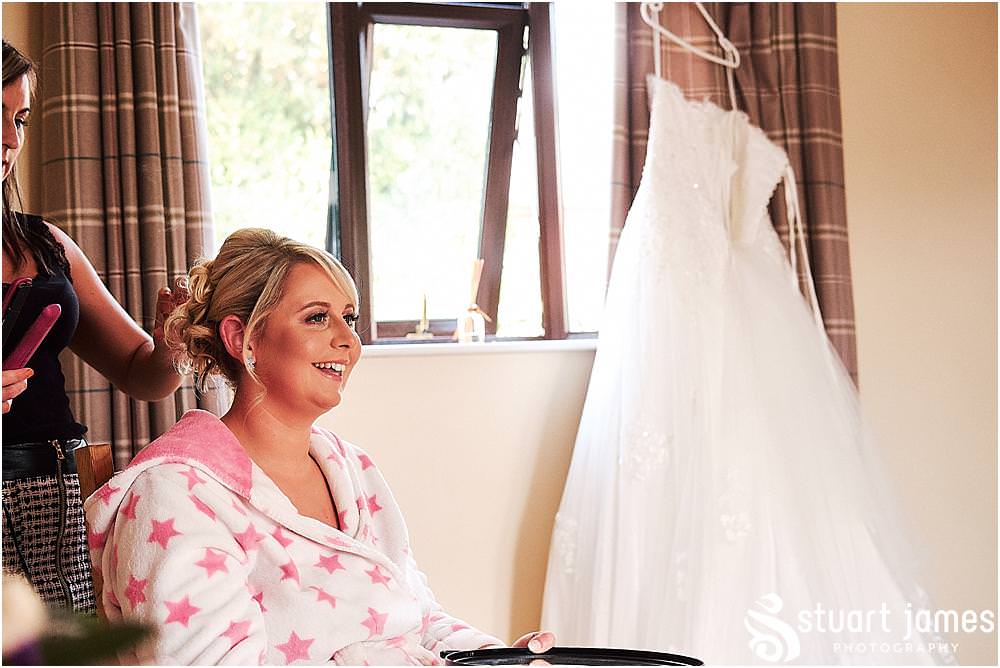 As the bridal hair and makeup are completed, it's nearly time for the wedding ceremony at Bramshall church. Photos by Uttoxeter Wedding Photographer Stuart James