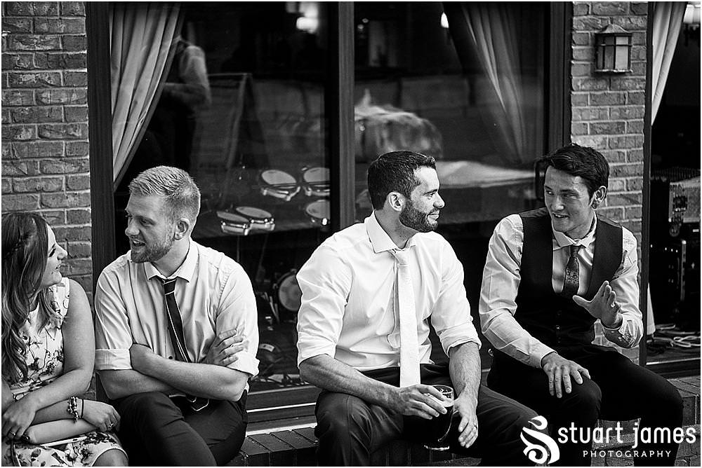 Natural photos that capture the fun of the wedding reception as the guests enjoy the perfect setting at Oak Farm Hotel in Cannock by Cannock Wedding Photographers Stuart James