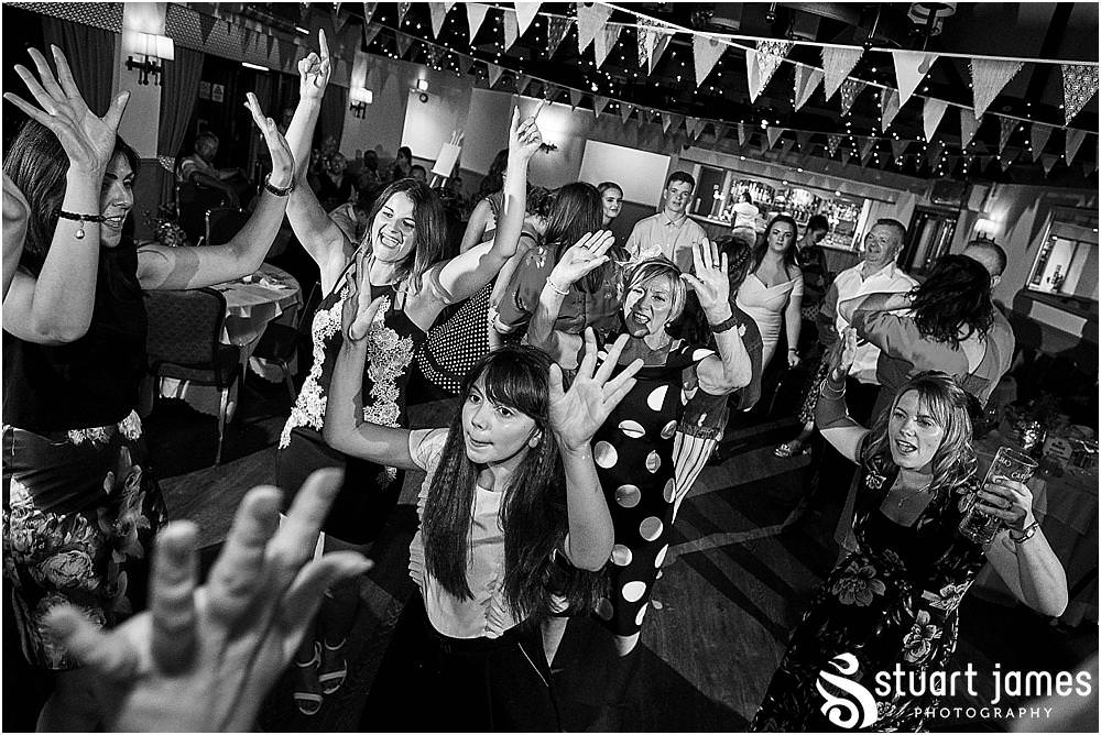 Right in the middle of the party, capturing every moment as the guests enjoy the most amazing wedding at Oak Farm Hotel in Cannock by Cannock Wedding Photographers Stuart James