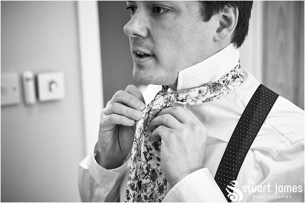 Candid photos as the groomsmen get ready for the wedding at Moxhull Hall in Sutton Coldfield by Moxhull Hall Wedding Photographer Stuart James