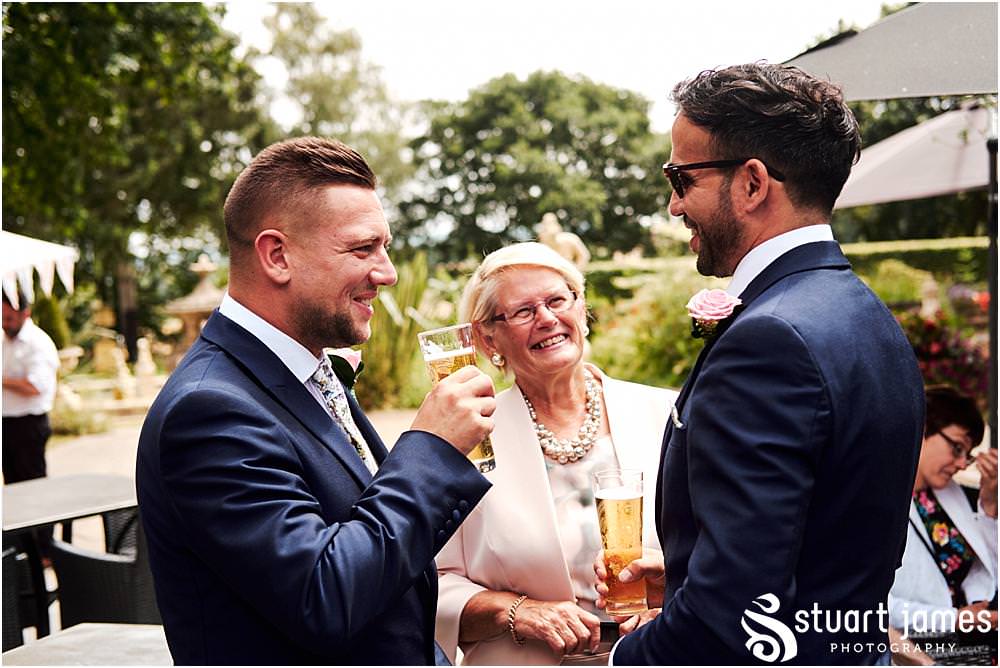Candid photographs as the guests arrive ready for the beautiful wedding ceremony at Moxhull Hall in Sutton Coldfield by Moxhull Hall Wedding Photographer Stuart James
