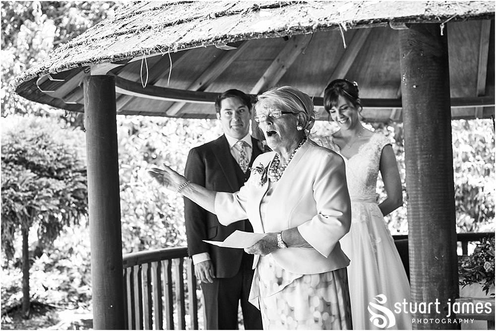 Unobtrusive photos that show the beautiful wedding ceremony in Galliopes Garden at Moxhull Hall in Sutton Coldfield by Moxhull Hall Wedding Photographer Stuart James