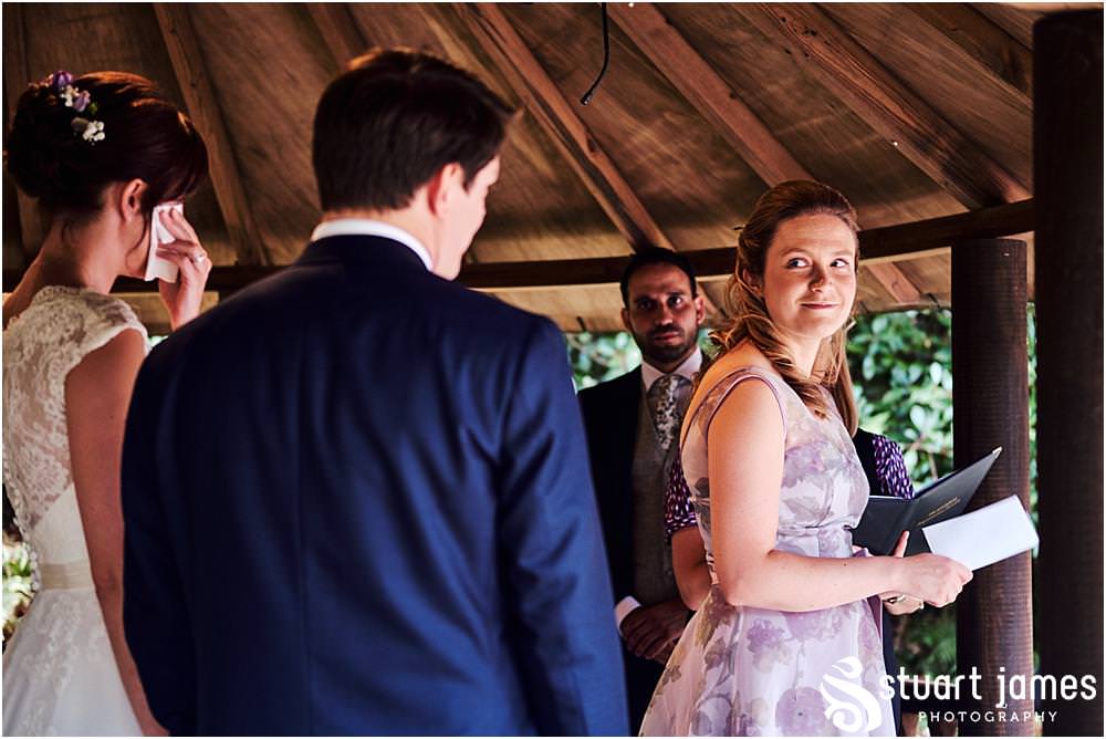 Unobtrusive photos that show the beautiful wedding ceremony in Galliopes Garden at Moxhull Hall in Sutton Coldfield by Moxhull Hall Wedding Photographer Stuart James