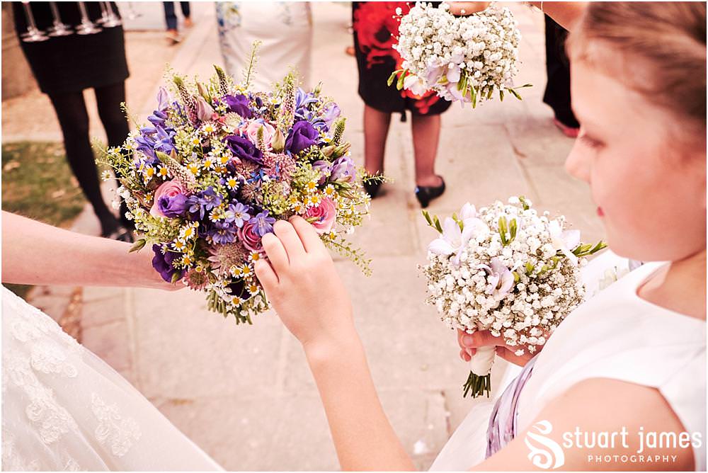 Fun candid photographs as the guests greet the new Mr & Mrs and enjoy the drinks reception on the lawns at Moxhull Hall in Sutton Coldfield by Moxhull Hall Wedding Photographer Stuart James