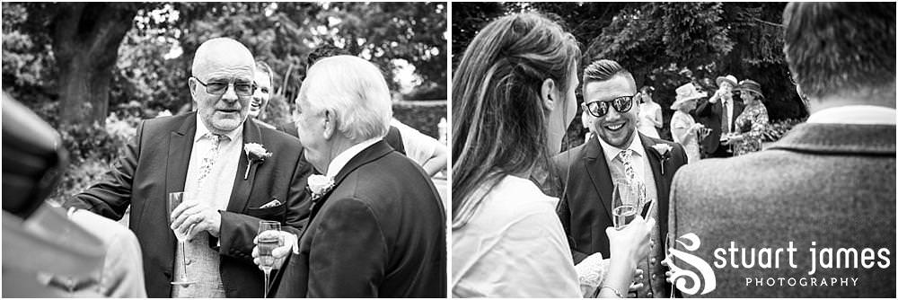 Fun candid photographs as the guests greet the new Mr & Mrs and enjoy the drinks reception on the lawns at Moxhull Hall in Sutton Coldfield by Moxhull Hall Wedding Photographer Stuart James