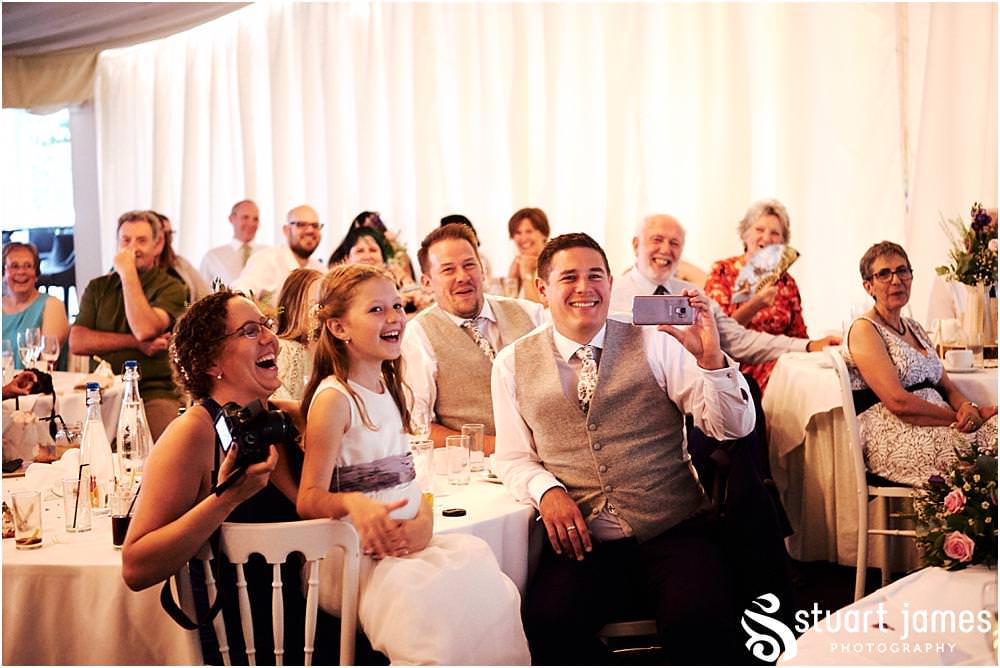 Documenting the wedding speeches and the amazing guest reactions at Moxhull Hall in Sutton Coldfield by Moxhull Hall Wedding Photographer Stuart James