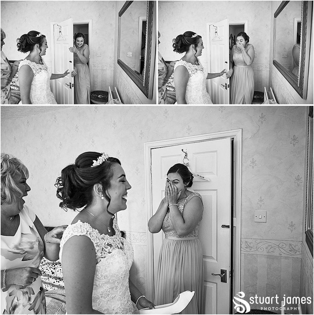 Beautiful moments to capture as the bride dresses in her perfect gown for her wedding at St Austins Church by Stafford Wedding Photographers Stuart James