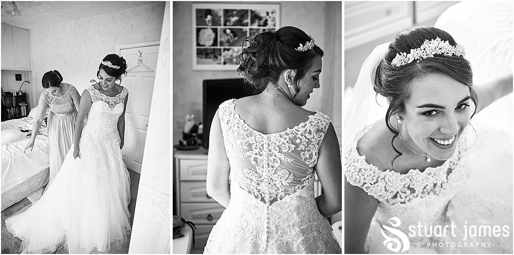 Beautiful moments to capture as the bride dresses in her perfect gown for her wedding at St Austins Church by Stafford Wedding Photographers Stuart James