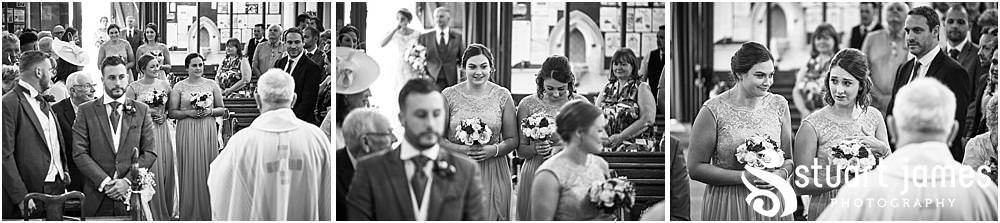 Such a beautiful moment to capture as the bridal party process into the wedding ceremony at St Austins Church by Stafford Wedding Photographers Stuart James