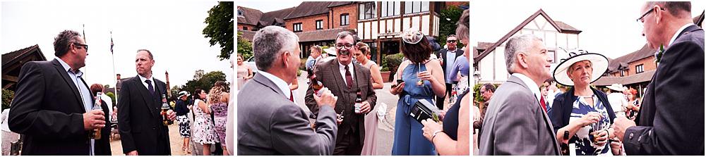 Capturing candid moments of the guests enjoying the fabulous setting for the wedding reception at The Moat House by Stafford Wedding Photographers Stuart James
