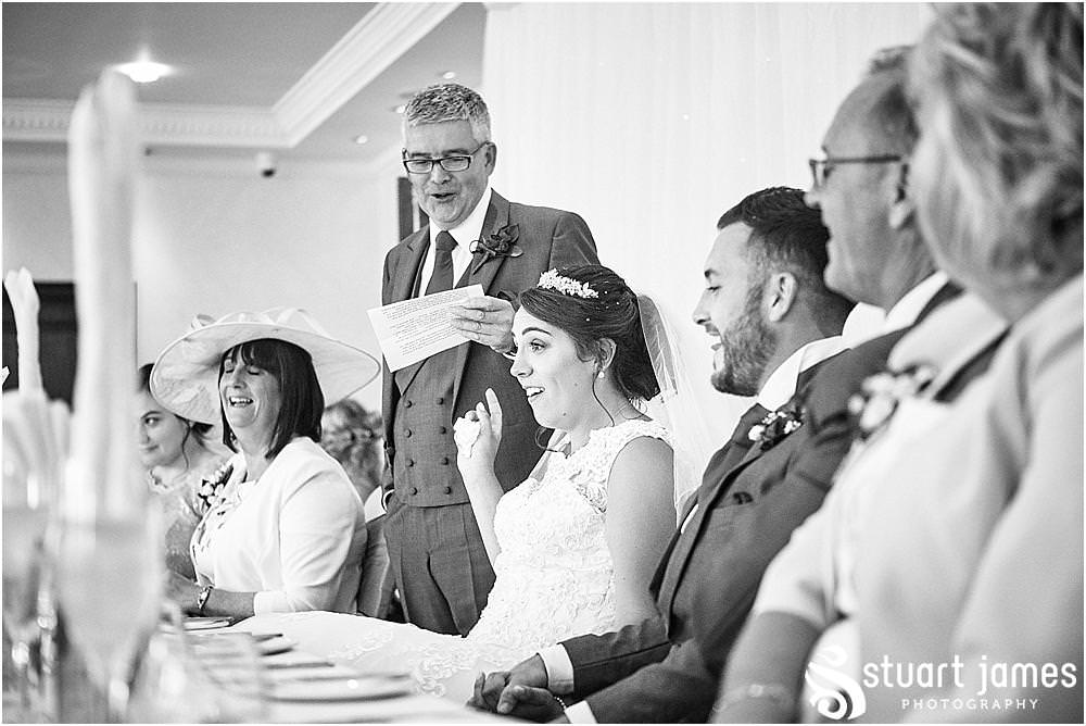 Such fabulous reactions to witness and capture as the wedding speeches are opened by the father of the bride at The Moat House by Stafford Wedding Photographers Stuart James