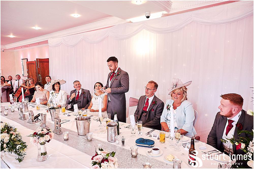 Capturing the wedding speeches and guest reactions as the grooms speech goes down a storm at The Moat House by Stafford Wedding Photographers Stuart James