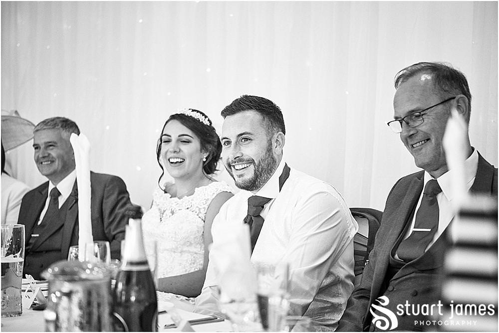 Fabulous reactions to capture as the best man's speech hits all the right spots at The Moat House by Stafford Wedding Photographers Stuart James