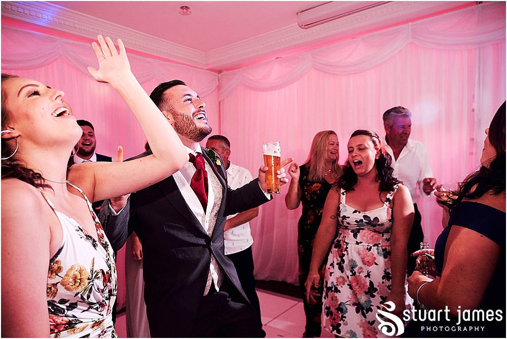 The party couldn't be held back as the dance floor was full before the first dance had chance at The Moat House by Stafford Wedding Photographers Stuart James