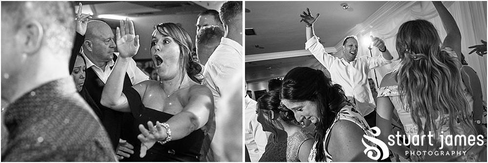 Amazing night photography showing the real energy and excitement of the wedding party at The Moat House by Stafford Wedding Photographers Stuart James