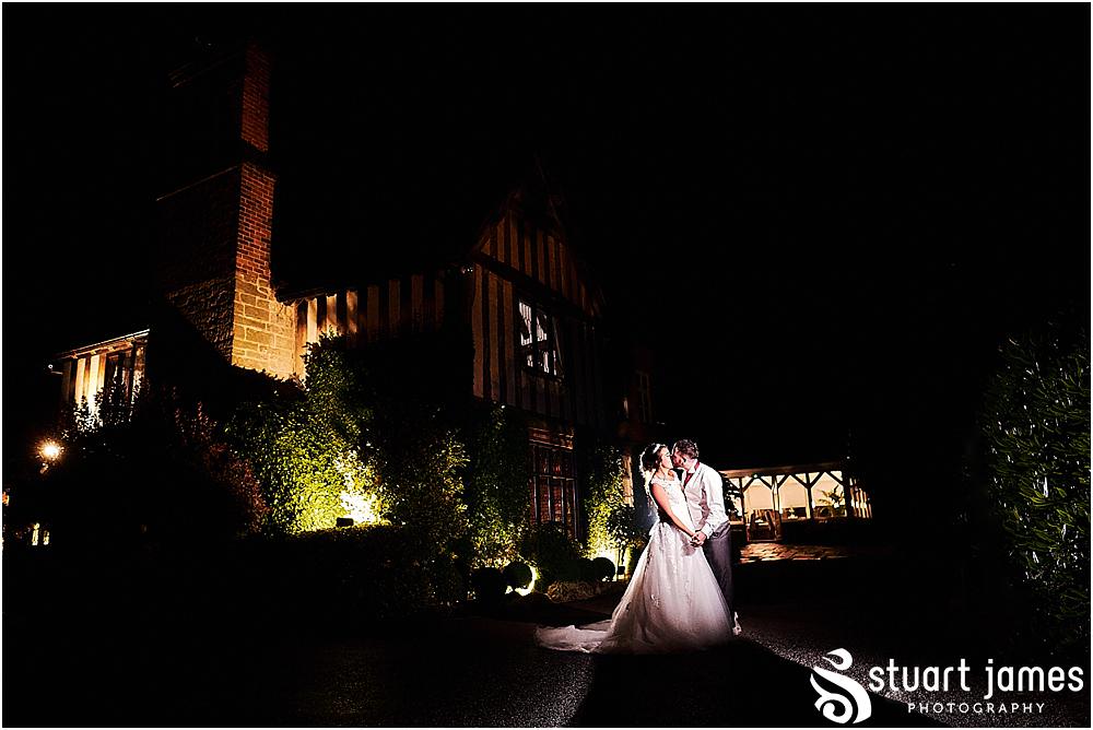 Finishing in style with signature night portraits at The Moat House by Stafford Wedding Photographers Stuart James