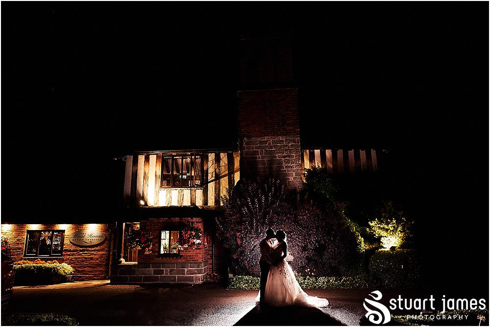 Finishing in style with signature night portraits at The Moat House by Stafford Wedding Photographers Stuart James