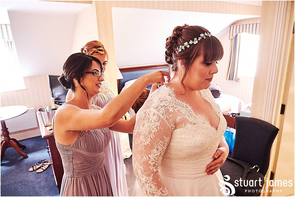 Capturing the final moments ahead of the wedding ceremony with the bridal party looking perfect for the wedding at Windmill Village in Coventry by Windmill Village Wedding Photographer Stuart James