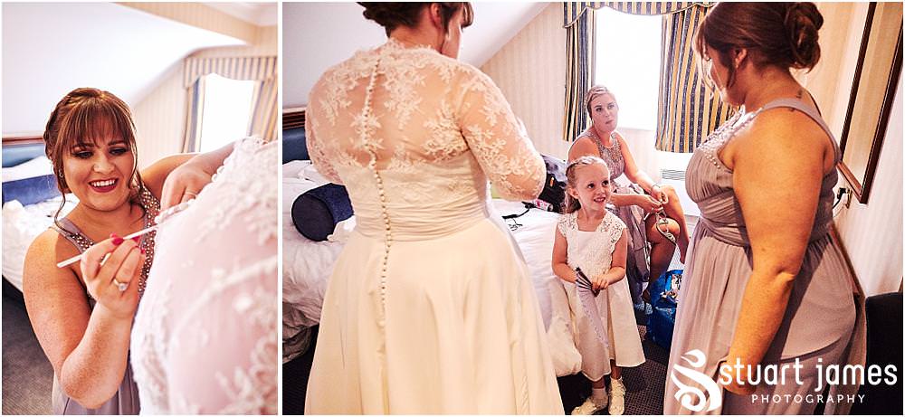 Creative photos capturing the mood and telling the story as it all comes together with our bride dressed in her stunning gown ready for the wedding at Windmill Village in Coventry by Windmill Village Wedding Photographer Stuart James