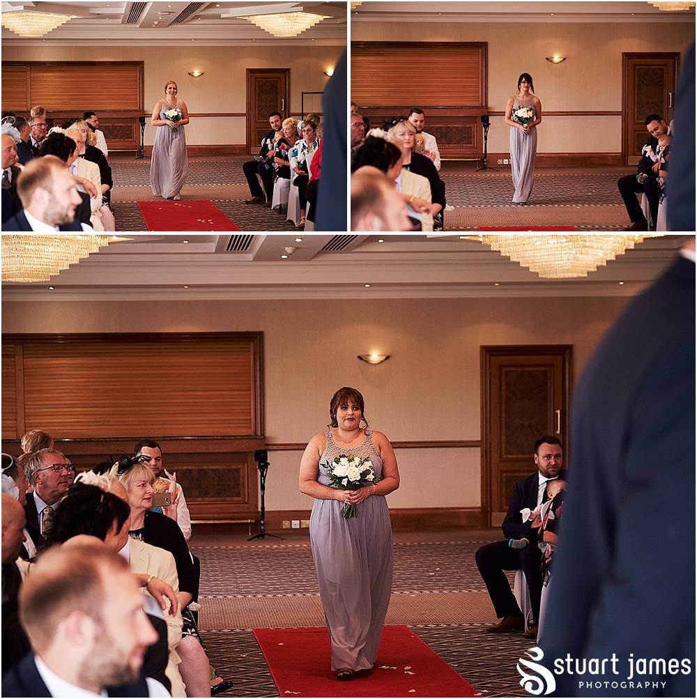 Unobtrusive photography and videography documenting the entrance of our bridal party into the ceremony at Windmill Village in Coventry by Windmill Village Wedding Photographer Stuart James