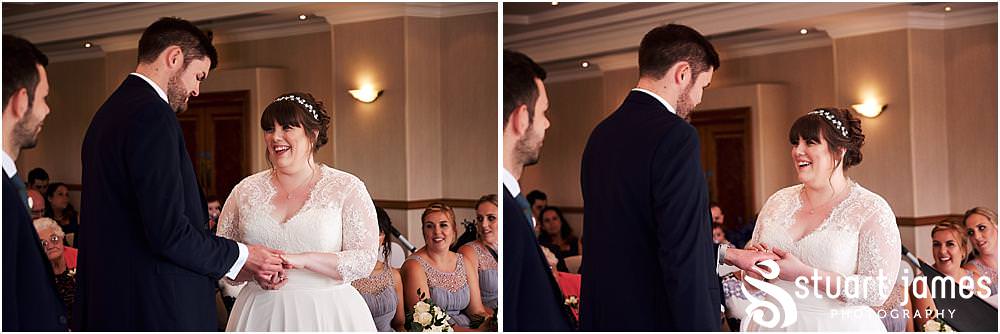 Capturing the looks and little moments that bring the memories of the wedding ceremony back to life at Windmill Village in Coventry by Windmill Village Wedding Photographer Stuart James