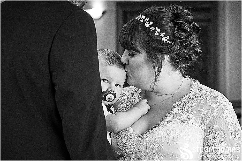 Natural photos that tell the story of the wedding ceremony at Windmill Village in Coventry by Windmill Village Wedding Photographer Stuart James