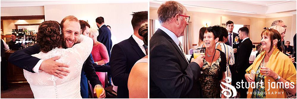 Candid photographs of the guests enjoying the drinks reception at Windmill Village in Coventry by Windmill Village Wedding Photographer Stuart James