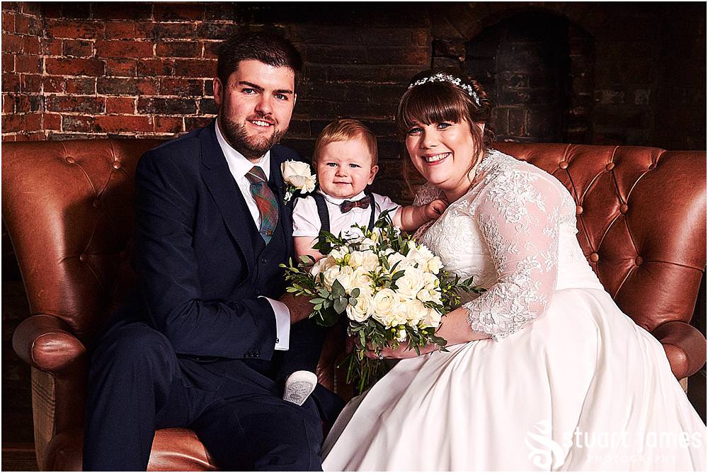 Formal family portraits in the manor house at Windmill Village in Coventry by Windmill Village Wedding Photographer Stuart James
