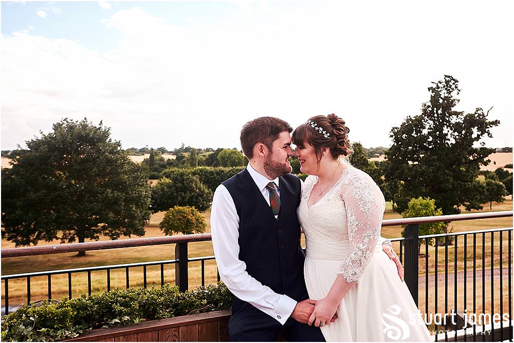 Creative relaxed portraits of our bride and groom ahead of the wedding breakfast at Windmill Village in Coventry by Windmill Village Wedding Photographer Stuart James