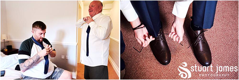 Capturing the relaxed preparations of the grooms party as they get ready for the wedding at Oak Farm Hotel in Cannock - Oak Farm Wedding Photographs by Stuart James