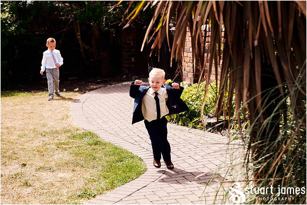 Candid photographs as the guests arrive for the wedding at Oak Farm Hotel in Cannock - Oak Farm Wedding Photographs by Stuart James