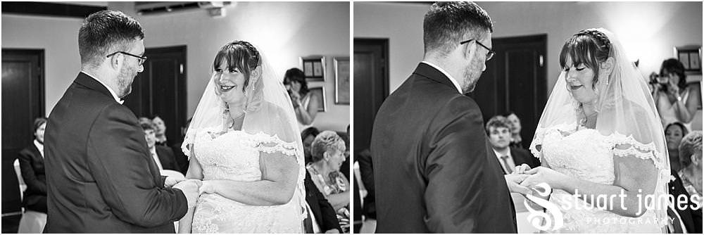 Unobtrusive storytelling photographs as the Bride and Groom say their vows at Oak Farm Hotel in Cannock - Oak Farm Wedding Photographs by Stuart James