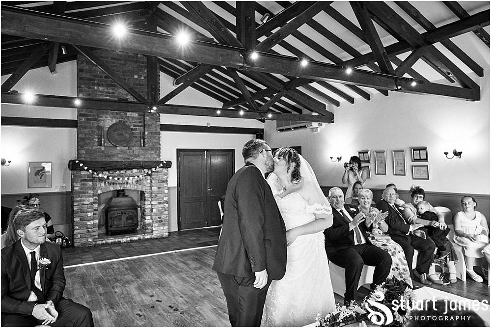 Unobtrusive storytelling photographs as the Bride and Groom say their vows at Oak Farm Hotel in Cannock - Oak Farm Wedding Photographs by Stuart James