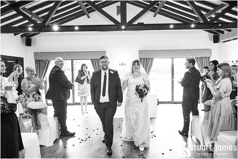 Unobtrusive storytelling photographs as the Bride and Groom say their vows at Oak Farm Hotel in Cannock - Oak Farm Wedding Photographs by Stuart James