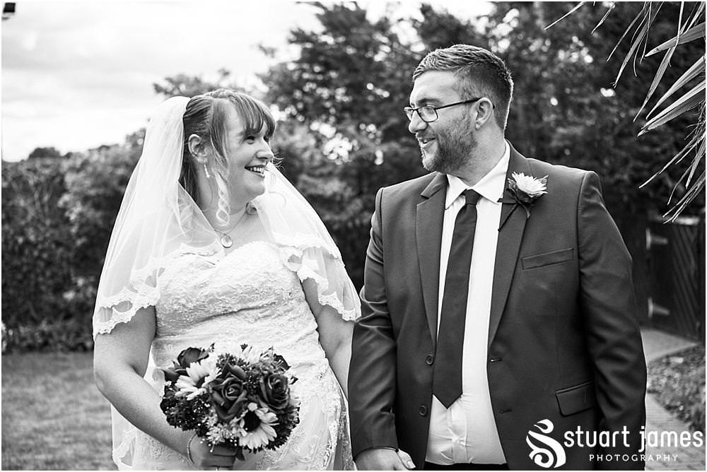 Relaxed portraits of the bride and groom in the beautiful gardens at Oak Farm Hotel in Cannock - Oak Farm Wedding Photographs by Stuart James