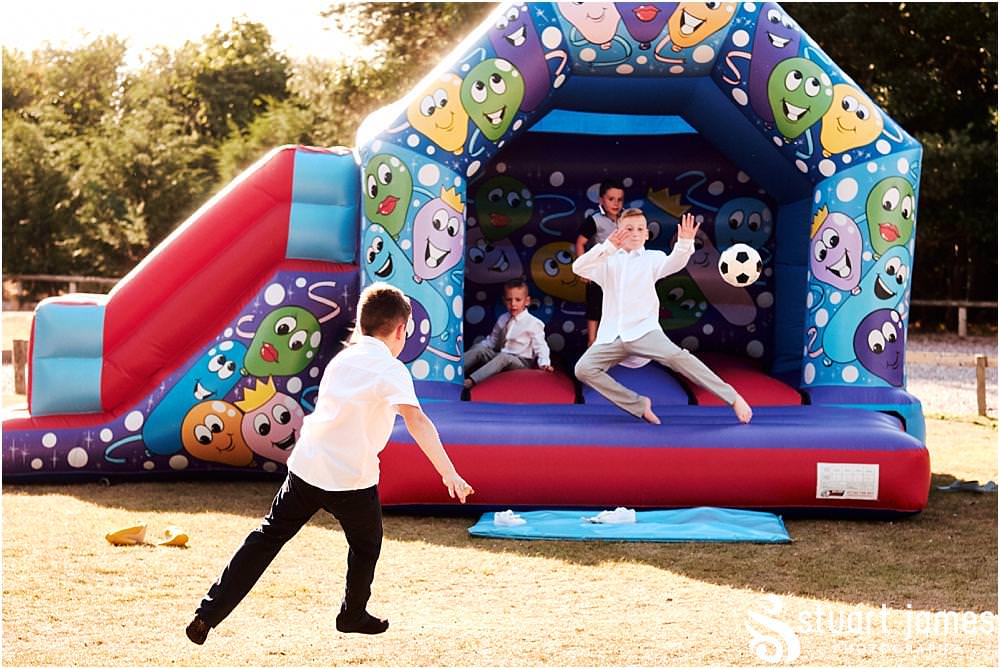 Photos that show the guests having an amazing time during the wedding reception at Oak Farm Hotel in Cannock - Oak Farm Wedding Photographs by Stuart James