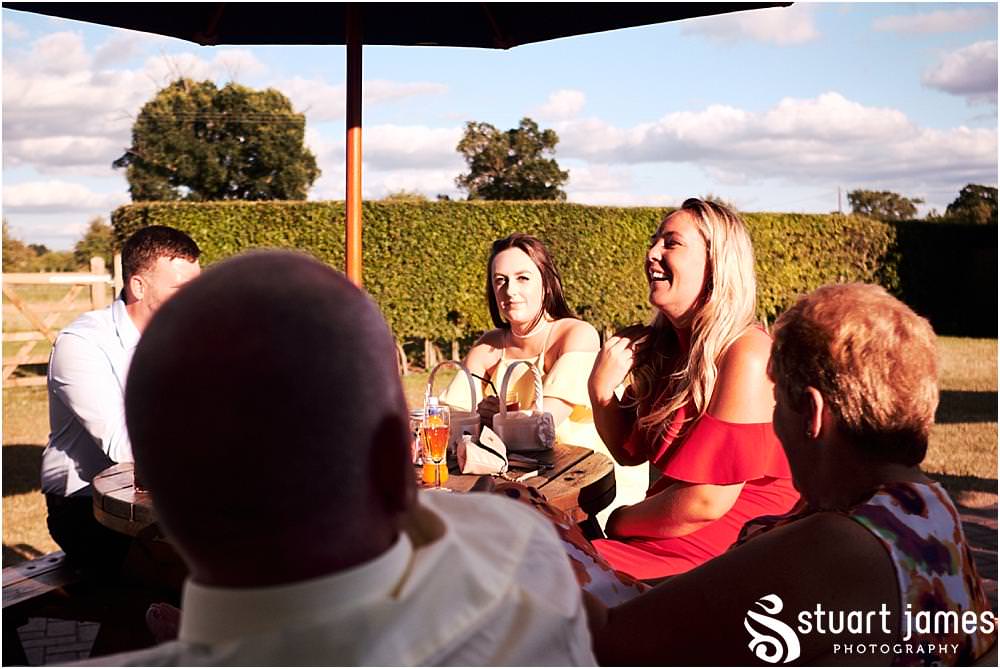 Photos that show the guests having an amazing time during the wedding reception at Oak Farm Hotel in Cannock - Oak Farm Wedding Photographs by Stuart James