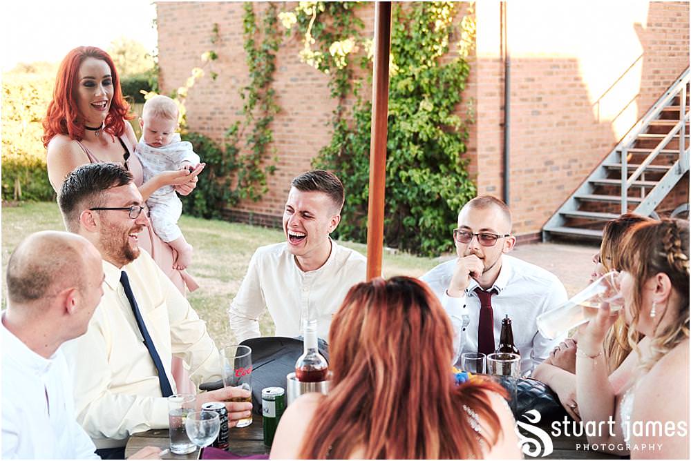 Photos that show the guests having an amazing time during the wedding reception at Oak Farm Hotel in Cannock - Oak Farm Wedding Photographs by Stuart James