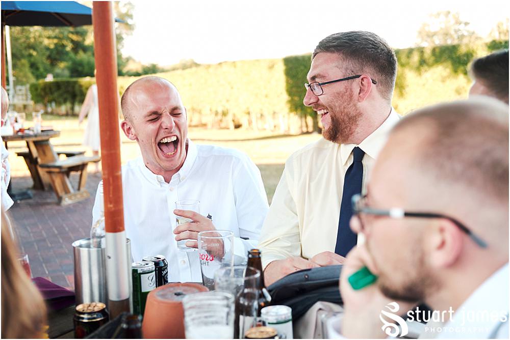 Relaxed candid photographs of the guests enjoying the evening reception at Oak Farm Hotel in Cannock - Oak Farm Wedding Photographs by Stuart James