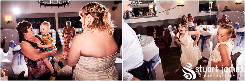 Capturing the fun of the night as the party gets underway at Oak Farm Hotel in Cannock - Oak Farm Wedding Photographs by Stuart James