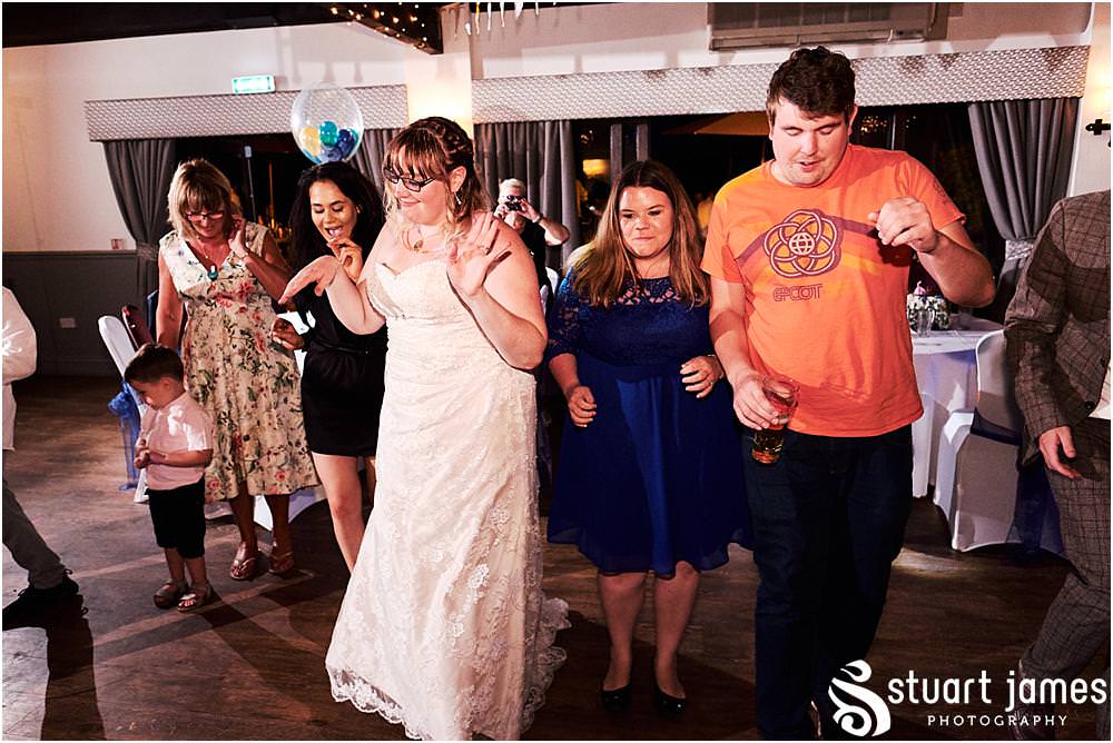 Capturing the fun of the night as the party gets underway at Oak Farm Hotel in Cannock - Oak Farm Wedding Photographs by Stuart James