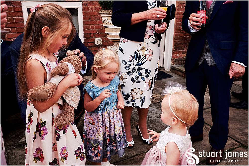 Capturing natural fun moments as the guests enjoy the drinks reception at Blakelands in Stourbridge by Documentary Wedding Photographer Stuart James