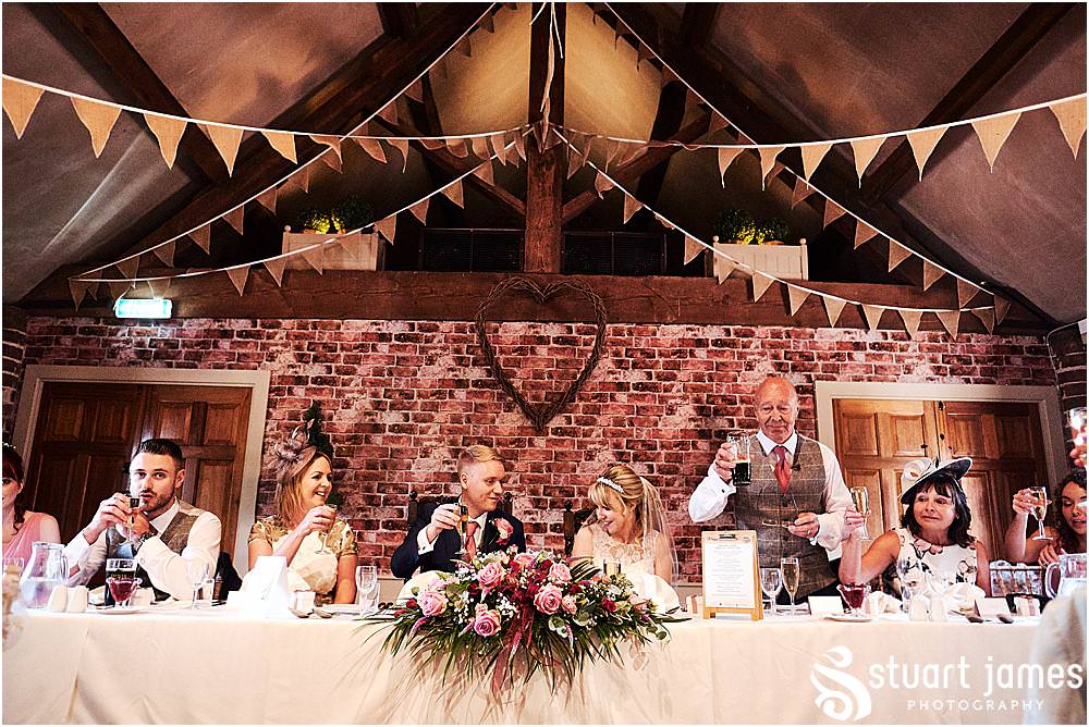 Such fabulous moments to capture with the wedding speeches drawing great guest reactions at Blakelands in Stourbridge by Documentary Wedding Photographer Stuart James