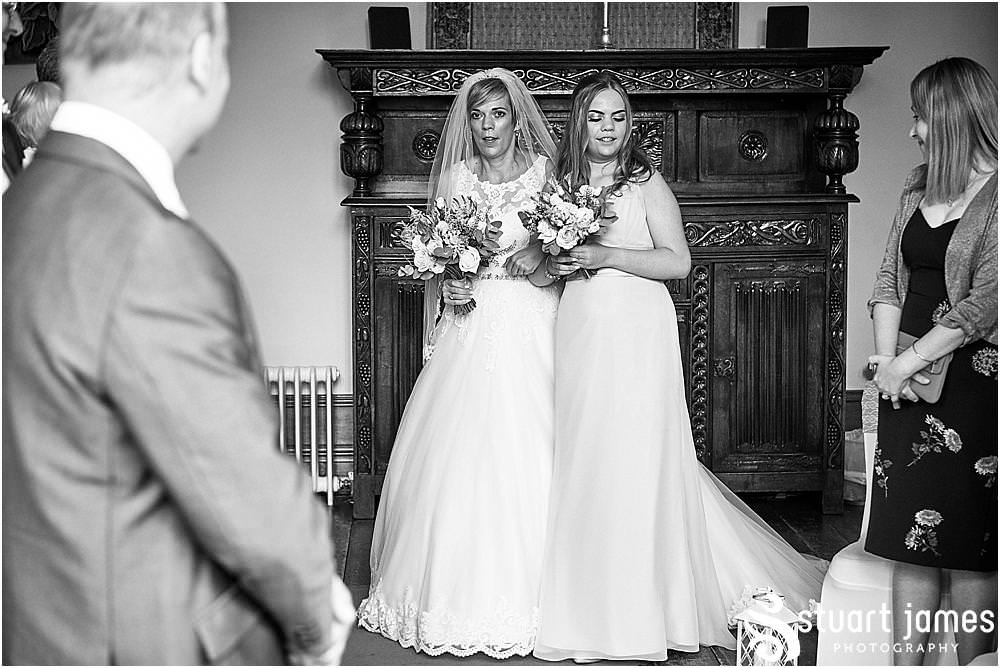 Such an emotional moment of the wedding as the Bride and Bridesmaids enter the ceremony at Hawkesyard Estate - Hawkesyard Wedding Photographs by Stuart James