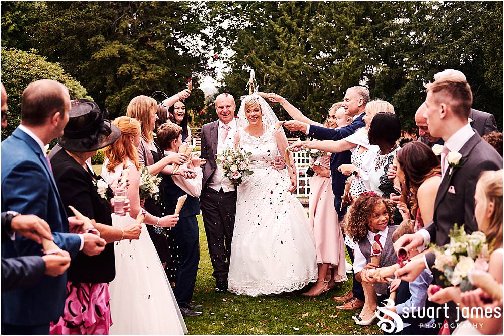 Family photographs and confetti fun at Hawkesyard Estate - Hawkesyard Wedding Photographs by Stuart James